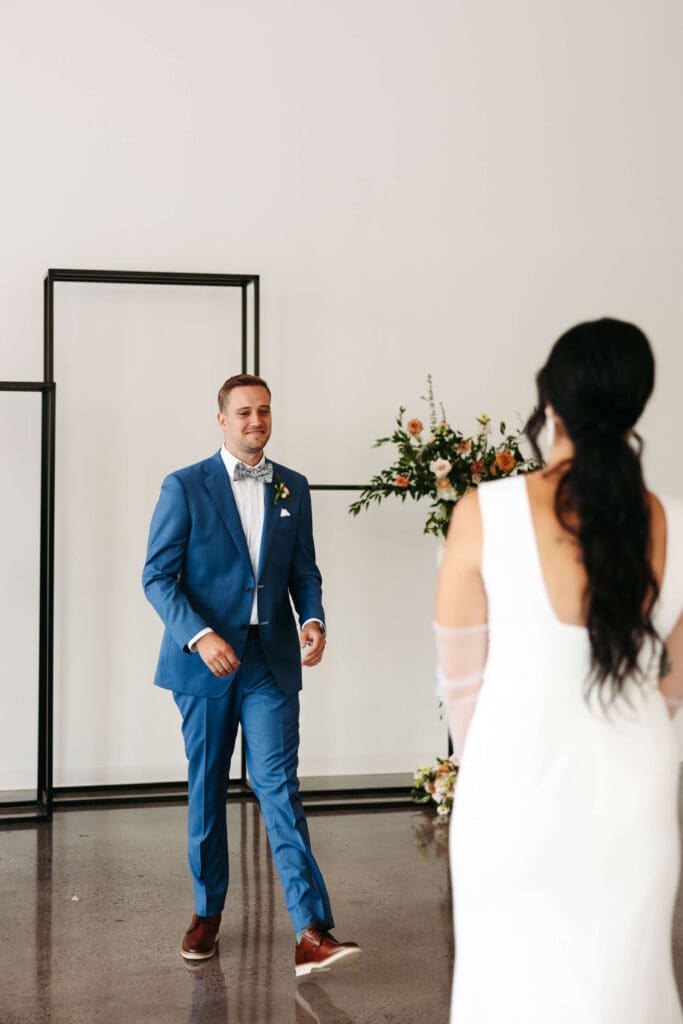 Groom tears up as he lays eyes on his bride for the first time