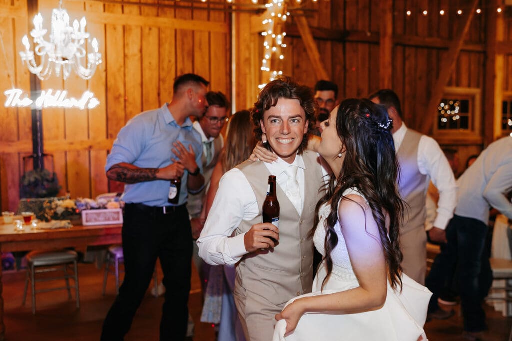 Bride and groom twirl and lose themselves in the moment of their Arizona destination wedding