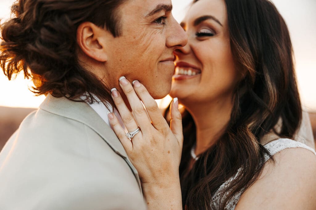 Bride and groom laugh in destination wedding photographer's shot