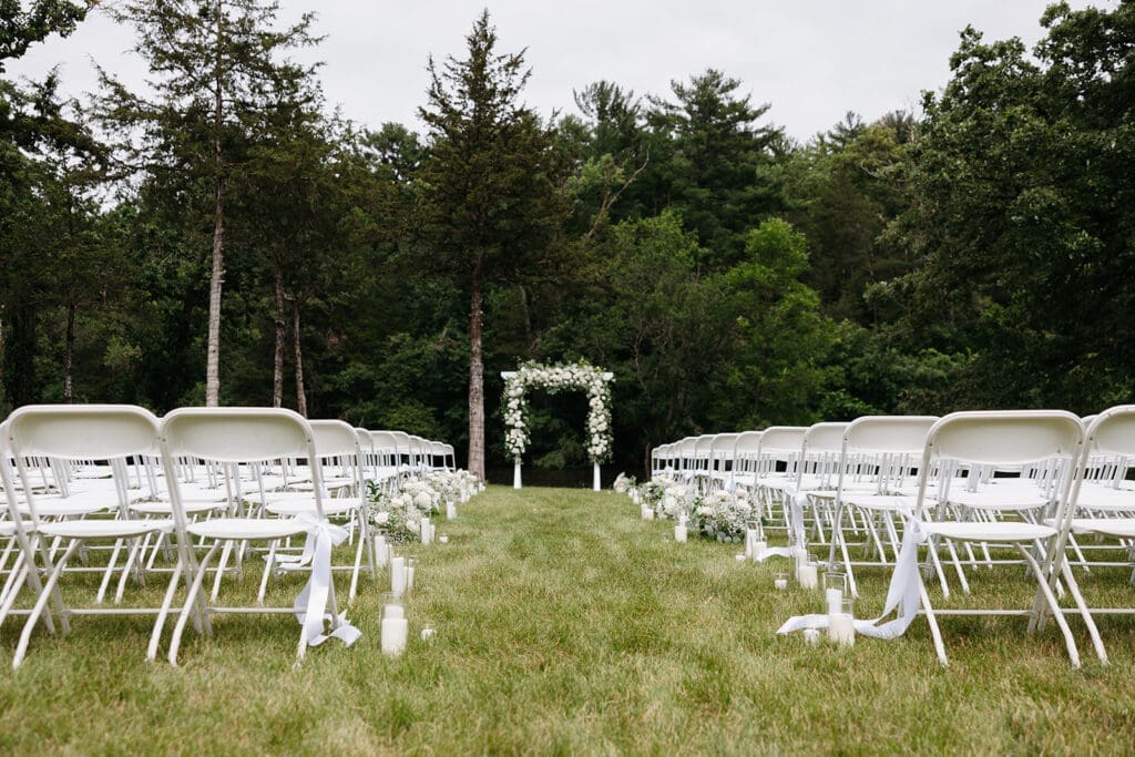 Outdoor ceremony setup with river views at La Pointe Events, a picturesque riverfront wedding venue in Minnesota.