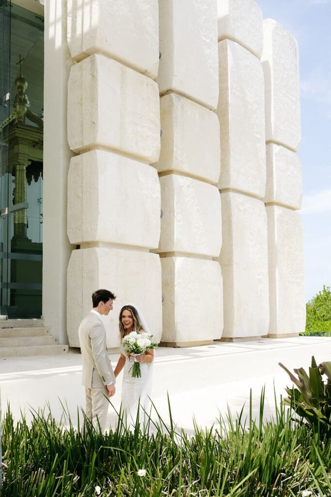 Bride and groom share a quiet moment together after their wedding first look before portraits begin.